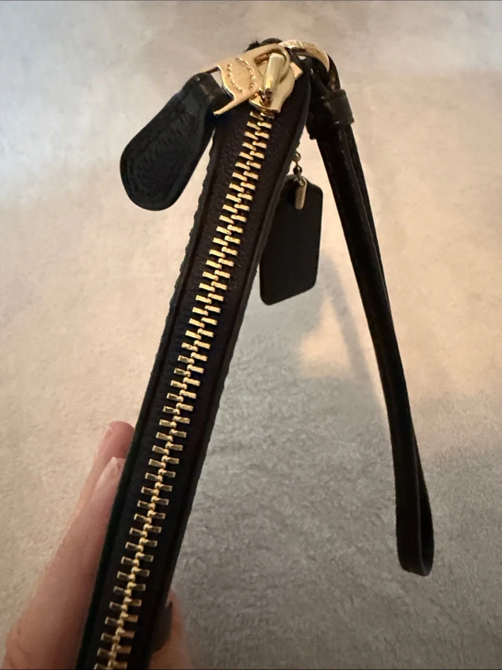 Coach Black Pebbled Leather Wristlet with Gold Logo
